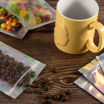 Load image into Gallery viewer, 100PCS S/M/L Flat Zip Lock Bag One Side Clear Holographic Laser Foil Zip Lock Bags - NINI SHOP

